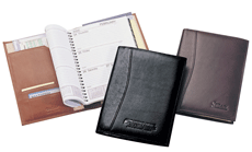 tan and brown leather agenda planners